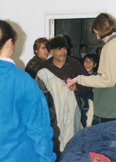 Giving aid at the Unfinished Hotel