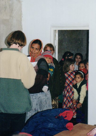 Giving aid at the Unfinished Hotel